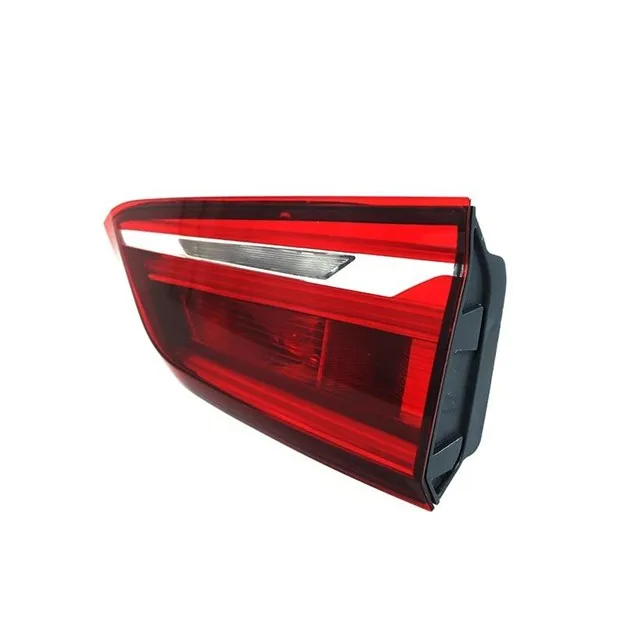 Red automotive taillight assembly with clear reverse light segment viewed from the side